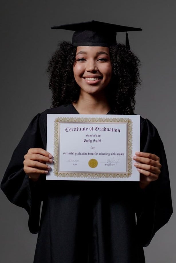 woman holding a diploma